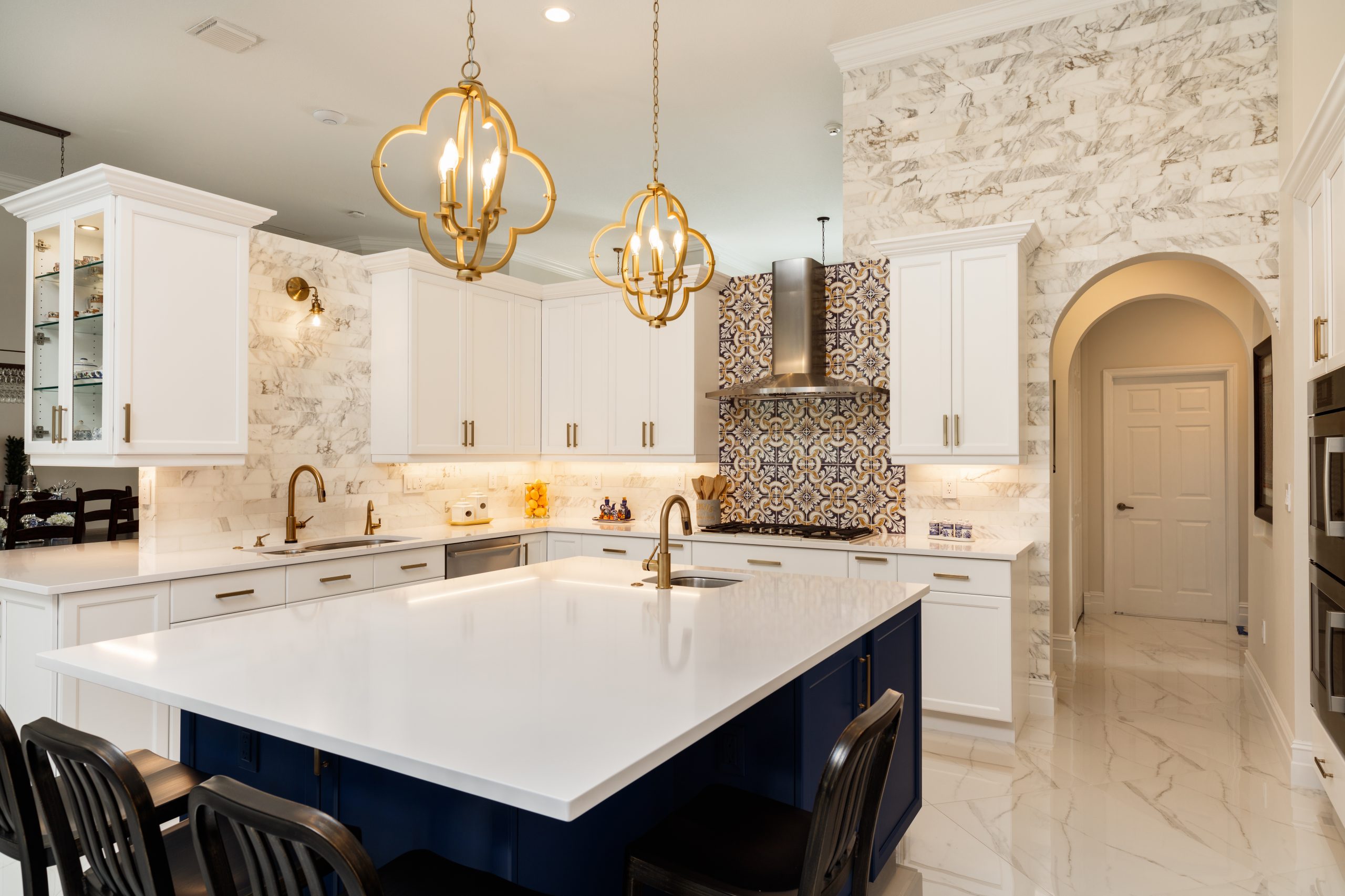 Beautiful luxury home kitchen with white cabinets.